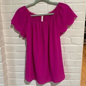 MTS pink scalloped top